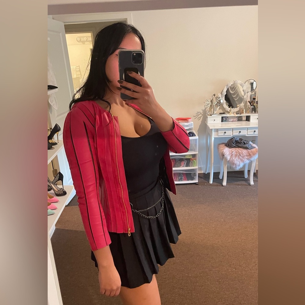 Hot pink leather jacket with gold zipper